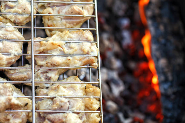 istock Chicken meat fried on a barbecue grill. 865094662