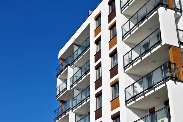 istock Modern, Luxury Apartment Building against blue sky 865098174