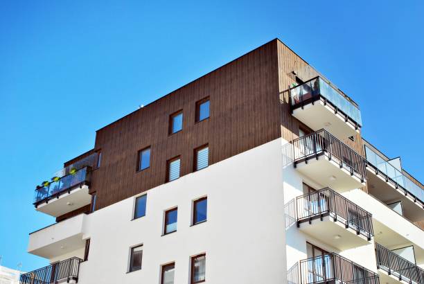istock Modern, Luxury Apartment Building against blue sky 865100536
