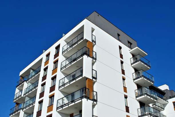 istock Modern, Luxury Apartment Building against blue sky 865100642