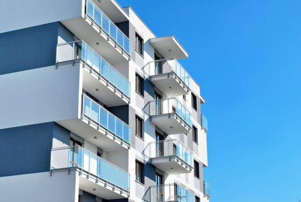 istock Modern, Luxury Apartment Building against blue sky 865101118