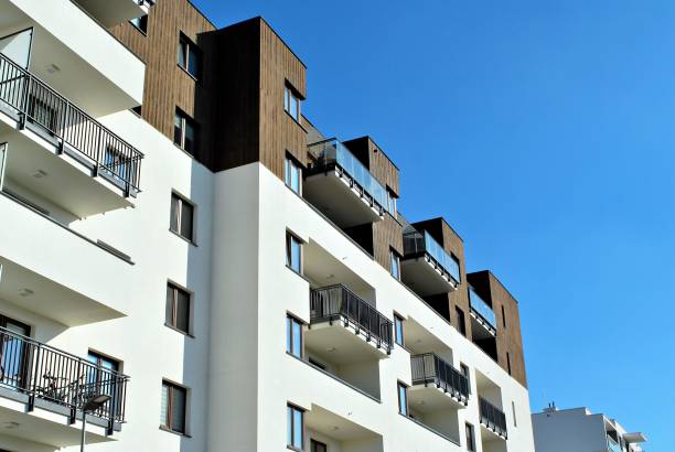 istock Modern, Luxury Apartment Building against blue sky 865102226
