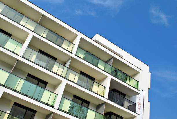 istock Modern, Luxury Apartment Building against blue sky 865108862