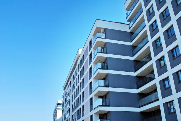 istock Modern, Luxury Apartment Building against blue sky 865108982