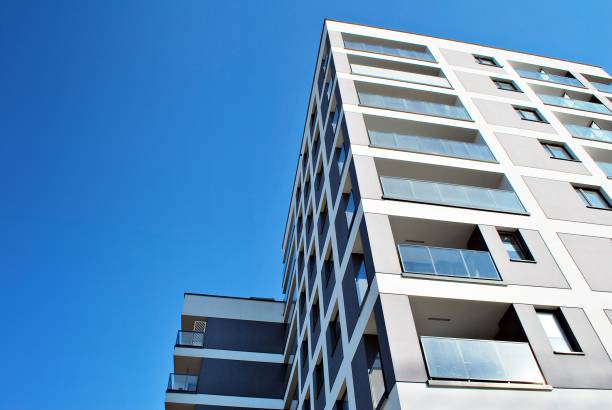 istock Modern, Luxury Apartment Building against blue sky 865111352