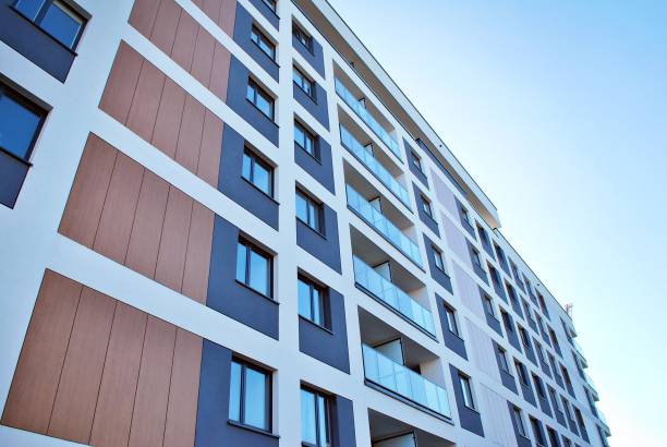 istock Modern, Luxury Apartment Building against blue sky 865111386