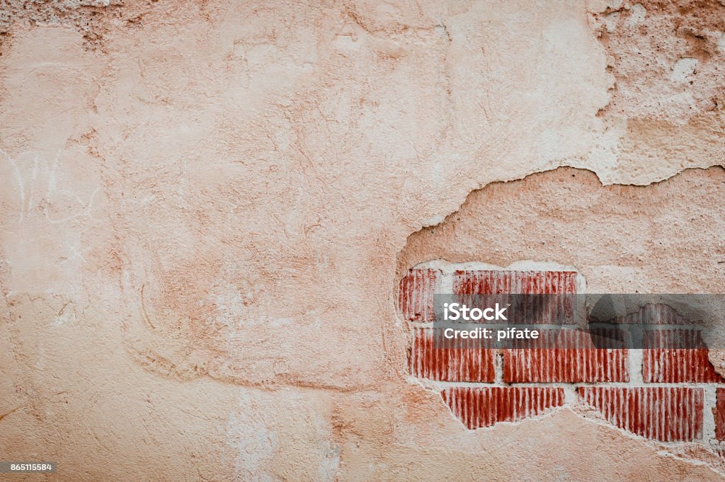 hole in an old brick wall - background Abandoned Stock Photo