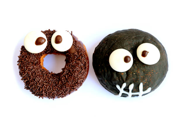 istock Monster Shaped Chocolate Doughnuts for Halloween Celebration 865125274