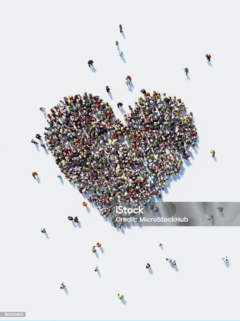 La foule humaine formant une forme de grand coeur : Amour et Don Concept - Photo de Coeur - Symbole d'une idée libre de droits