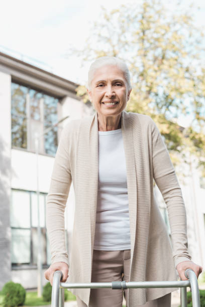 istock senior woman with walker 865127066
