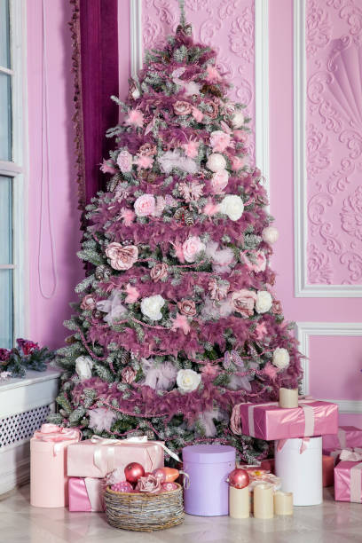istock New Year tree decorated in pink toys 865132604