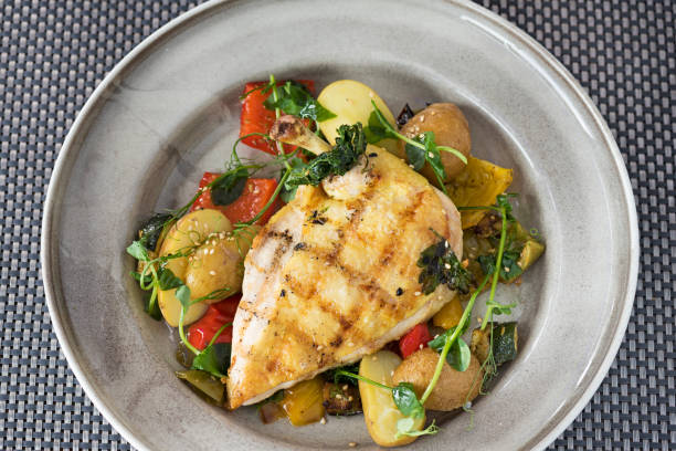 istock Chicken grilled breast with baked potatoes 865135332