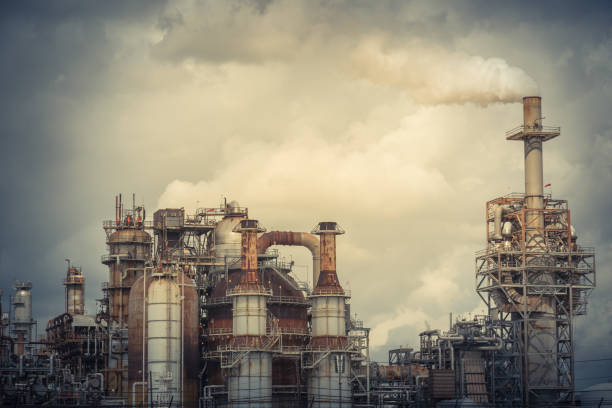 istock Smoke stack at oil refinery in Pasadena, Texas, USA 865139410