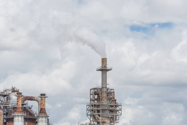 istock Smoke stack at oil refinery in Pasadena, Texas, USA 865139514