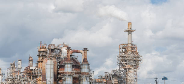 istock Smoke stack at oil refinery in Pasadena, Texas, USA 865139882