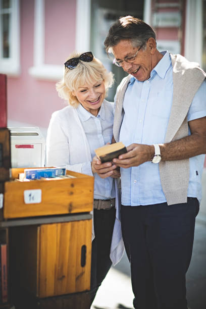 istock Senior couple  viewing the book 865139908