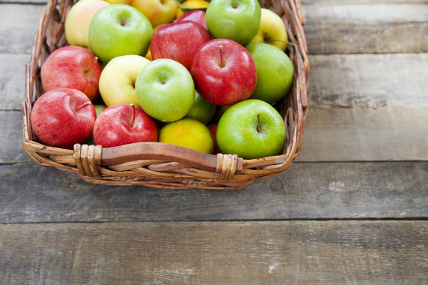 istock Fresh red apples in the wooden box 865146514