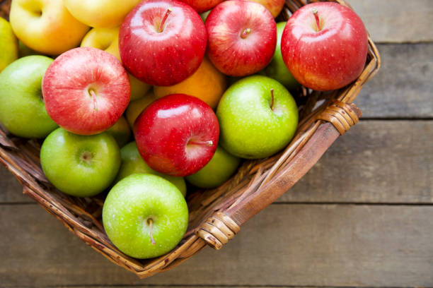 istock Fresh red apples in the wooden box 865146518