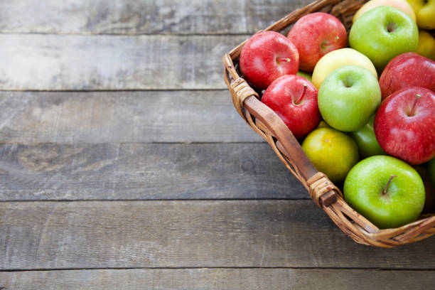 istock Fresh red apples in the wooden box 865146534