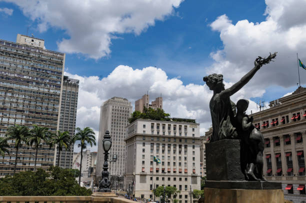 Sao Paolo, Sao Paolo - Brazil - February 11 2017 - Town House - people moving arround the square to shopping and lunch crossing through the Sao Paolo's Town House - Sao Paulo downtown