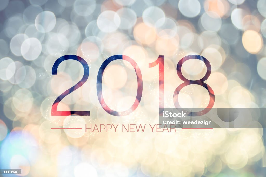 Happy new year 2018 with pale yellow bokeh light sparkling background,Holiday greeting card Happy new year 2018 with pale yellow bokeh light sparkling background,Holiday greeting card. 2018 Stock Photo