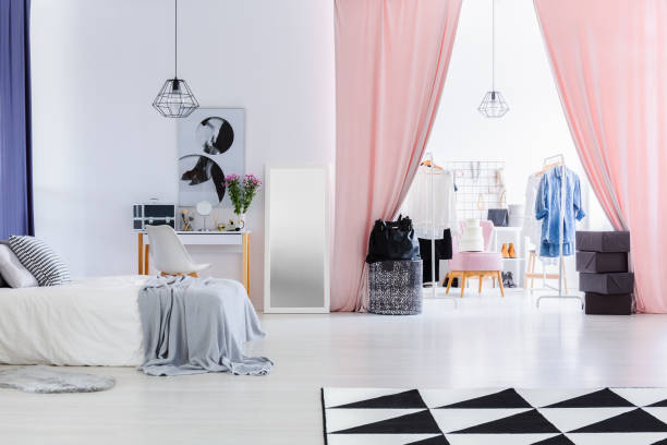 istock Velvet pink curtains in bedroom 865154356