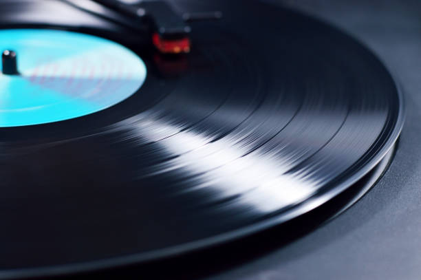 istock vinyl disc spinning on turntable with needle detail 865170568