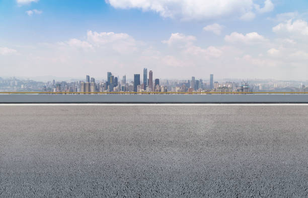 istock Road and city skyline 865192714