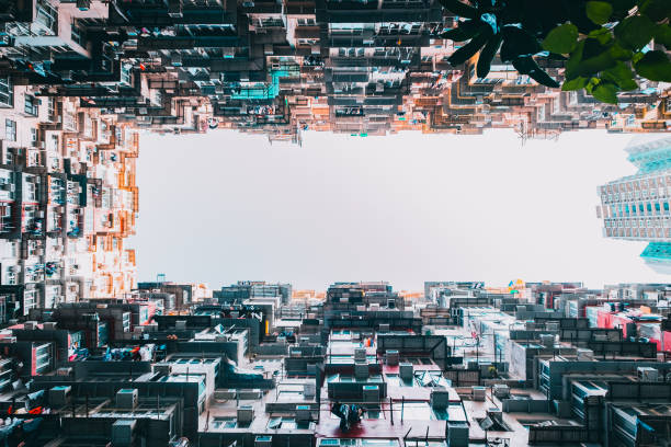 istock Looking up at old building to sky in perspective view 865200588