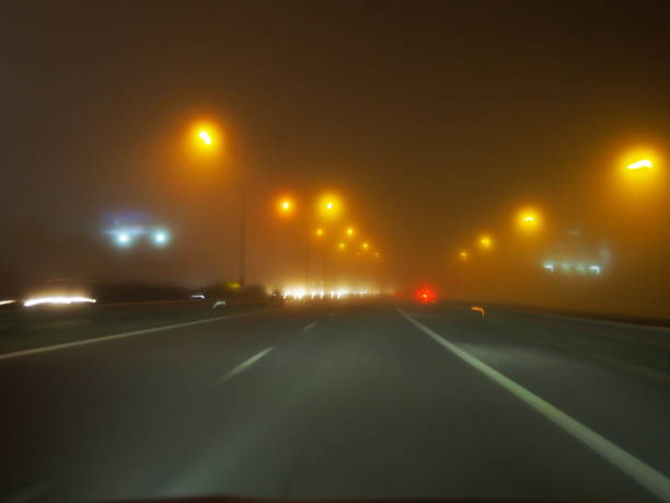 istock Drivers personal perspective night fogy shot 865203232