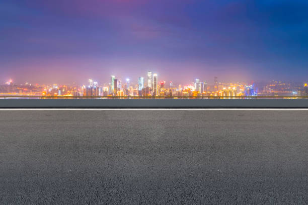 istock Road and city skyline 865206180