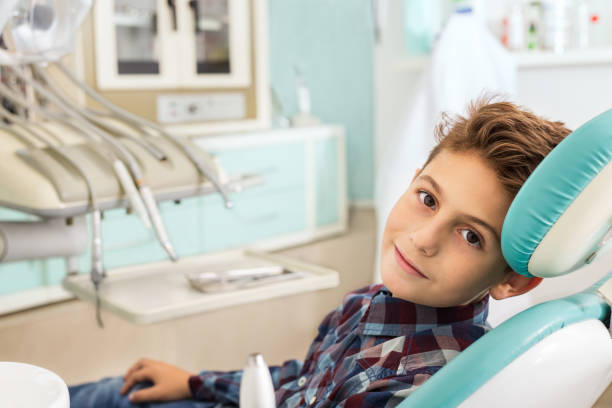 istock Child in dental office 865215644