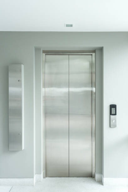 istock modern elevator made of metal in building 865220828