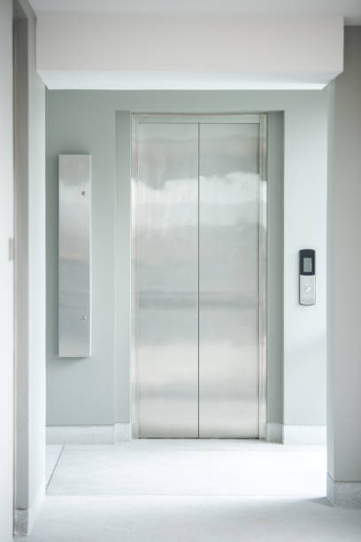 istock modern elevator made of metal in building 865220840