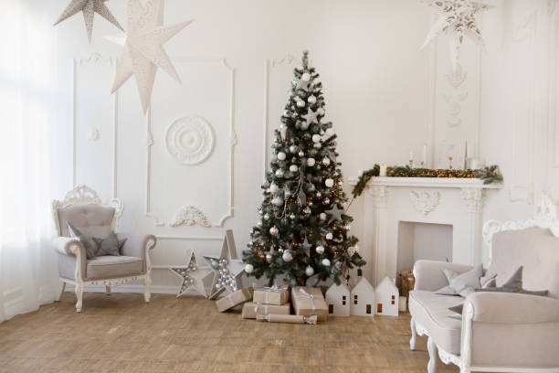istock Interior living room with a Christmas tree and decorations. 865237578