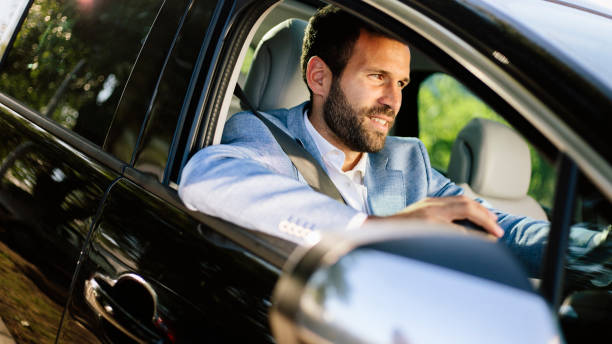 istock Young businessman in car 865240674
