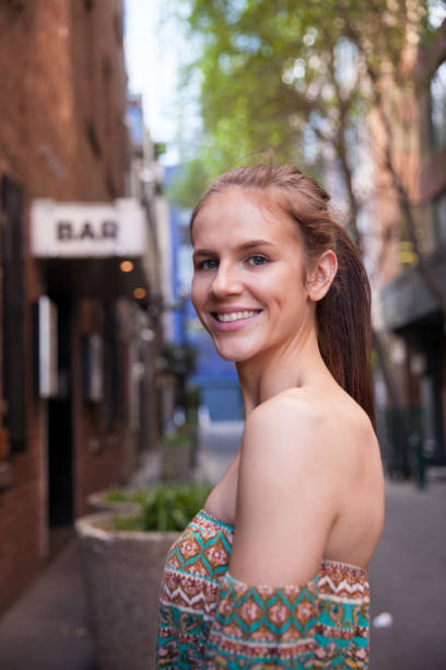 istock Young Woman About to Go into the Bar 865245316