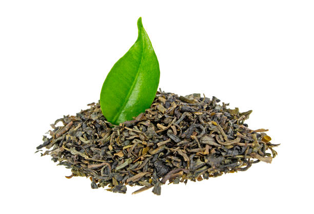 istock Green tea with leaf isolated on white background 865245960