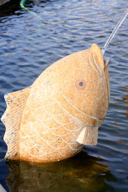 istock Fish sculpture handicraft, closeup of photo 865249332
