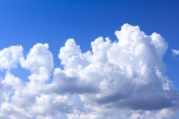 istock Blue sky with white clouds. rain clouds on sunny summer or spring day. 865252792