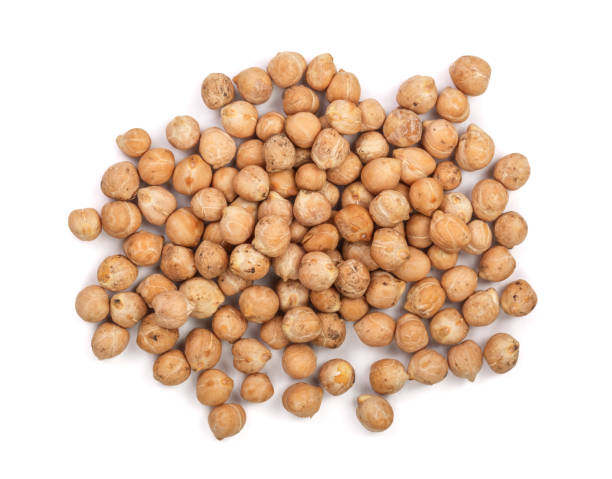 istock Dry raw organic chickpeas isolated on white background. Top view 865253268