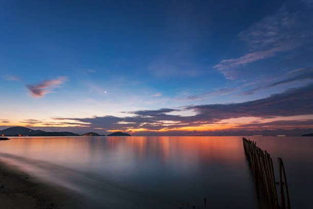 istock Beautiful sunrise or sunset with tropical sea. 865254224