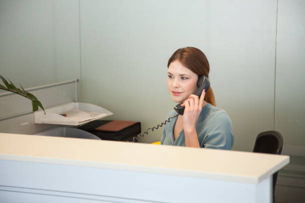 istock Business secretary on the phone 865254430