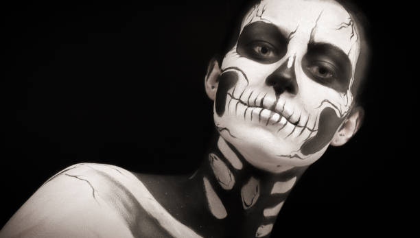istock Pretty woman with skeleton tattoo 865255486