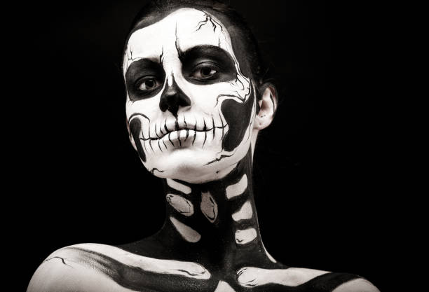 istock Pretty woman with skeleton tattoo 865256578