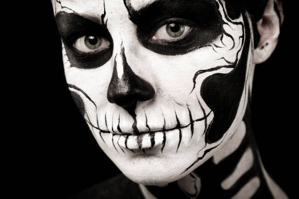 istock Pretty woman with skeleton tattoo 865256602