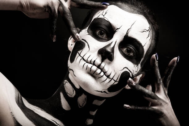 istock Pretty woman with skeleton tattoo 865256614