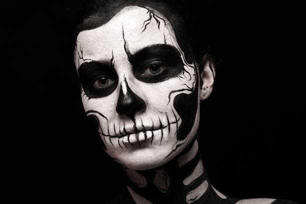 istock Pretty woman with skeleton tattoo 865256620