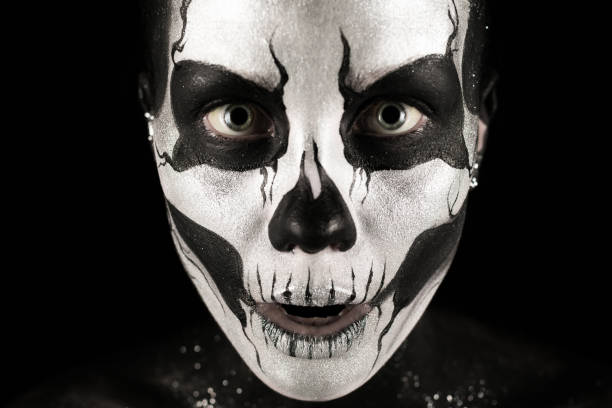 istock Pretty girl with skeleton tattoo 865257314