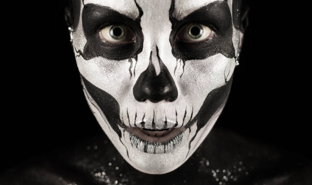 istock Pretty girl with skeleton tattoo 865257328